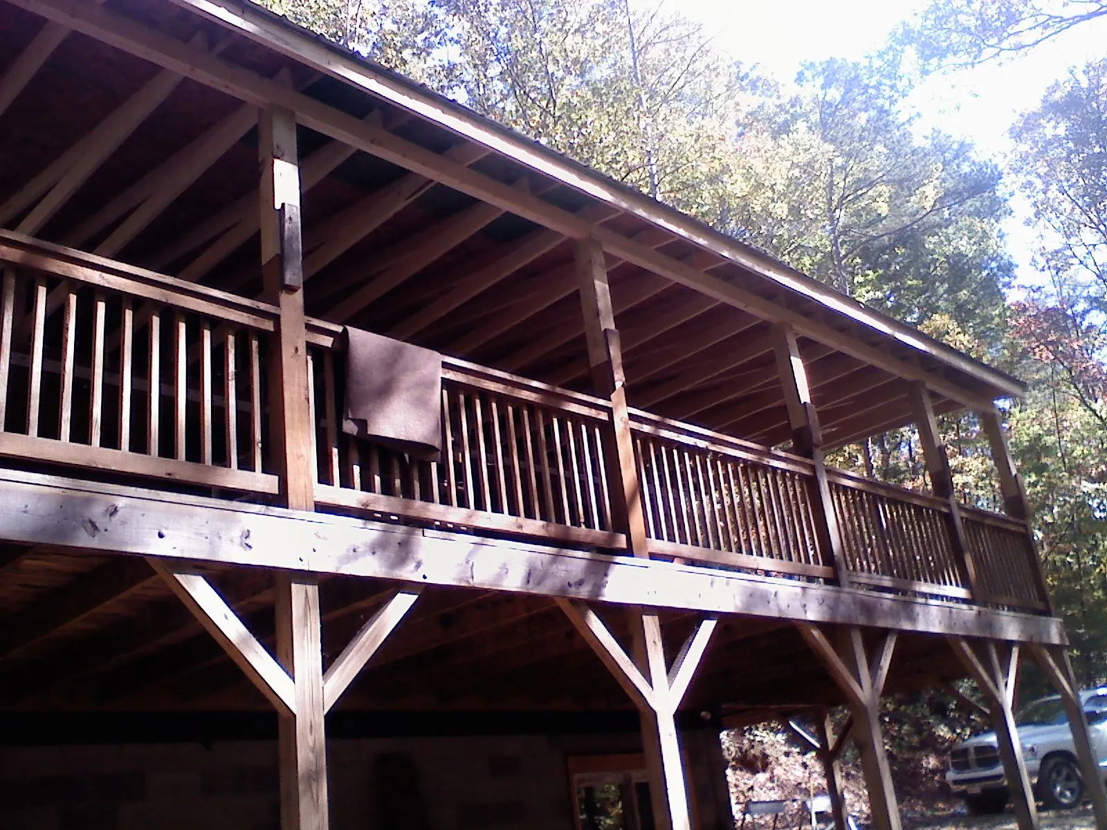 Timber framing under a new elevated porch and deck — Roof Leak Repair in Floyd by Roofing Brothers